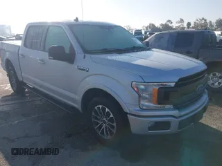 2019 Ford F-150 XL with VIN 1FTEW1CP4KKC34877, listed as a IAAI auction lot 41647021 with 61,974 mi miles and . Bid and sale history available at carsss.com. Image 1.