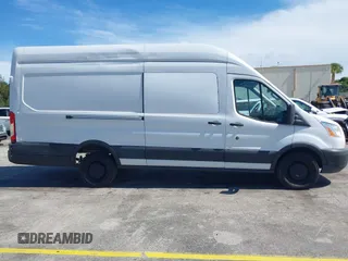 2018 Ford Transit Cargo с VIN 1FTBW3XG0JKA74049, выставлен на аукционе IAAI как лот 42607175 с пробегом 79 297 миль миль и . История ставок и продаж доступна на DreamBid. Изображение 13.