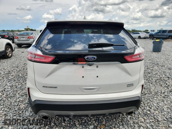 2020 Ford Edge SEL с VIN 2FMPK3J95LBA94317, выставлен на аукционе Copart как лот 62389575 с пробегом 38 523 миль миль и Списание • Salvage title. История ставок и продаж доступна на DreamBid. Изображение 6.
