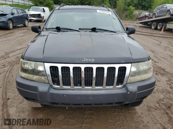 2003 Jeep Grand Cherokee Laredo z VIN 1J4GW48S53C568929, wystawiony jako Copart lot #57604245 z przebiegiem 216 103 mil mil oraz Czysty tytuł • Clean title. Historia ofert i sprzedaży dostępna na DreamBid. Obrazek 5.