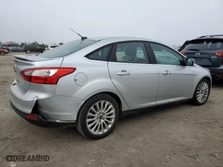 2012 Ford Focus Titanium with VIN 1FAHP3J21CL293447, listed as a Copart auction lot 43963615 with 151,448 mi miles and Salvage Title. Bid and sale history available at carsss.com. Image 3.