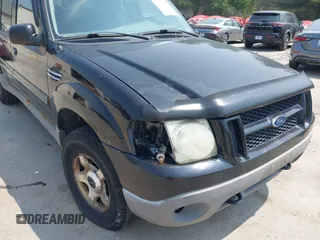 2003 Ford Explorer Sport Trac XLS z VIN 1FMZU77EX3UA50273, wystawiony jako IAAI lot #42406881 z przebiegiem 217 961 mil mil oraz . Historia ofert i sprzedaży dostępna na DreamBid. Obrazek 6.