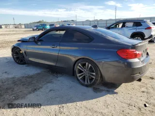 2015 BMW 4 Series 435i xDrive z VIN WBA3R5C56FK371987, wystawiony jako Copart lot #88077015 z przebiegiem Nie podano mil oraz Szkoda całkowita • Salvage title. Historia ofert i sprzedaży dostępna na DreamBid. Obrazek 2.