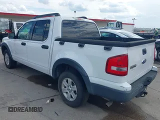 2007 Ford Explorer Sport Trac XLT z VIN 1FMEU31K07UB56341, wystawiony jako IAAI lot #42646998 z przebiegiem 132 347 mil mil oraz . Historia ofert i sprzedaży dostępna na DreamBid. Obrazek 3.