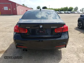 2018 BMW 3 Series 330i xDrive with VIN WBA8D9G57JNU69424, listed as a Copart auction lot 60550005 with 106,769 mi miles and Clean title. Bid and sale history available at DreamBid. Image 6.