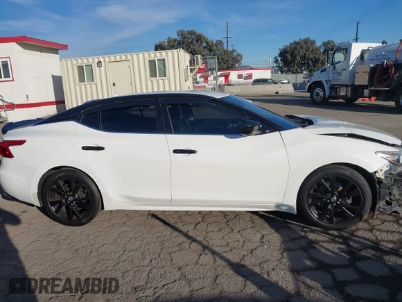 2017 Nissan Maxima SV with VIN 1N4AA6APXHC392355, listed as a IAAI auction lot 41153272 with 83,384 mi miles and . Bid and sale history available at DreamBid. Image 14.