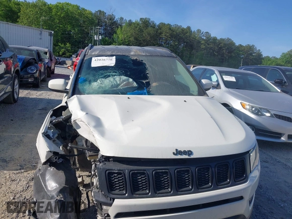 2021 Jeep Compass Altitude with VIN 3C4NJDBB2MT596181, listed as a IAAI auction lot 42026716 with 69,526 mi miles and . Bid and sale history available at DreamBid. Image 12.