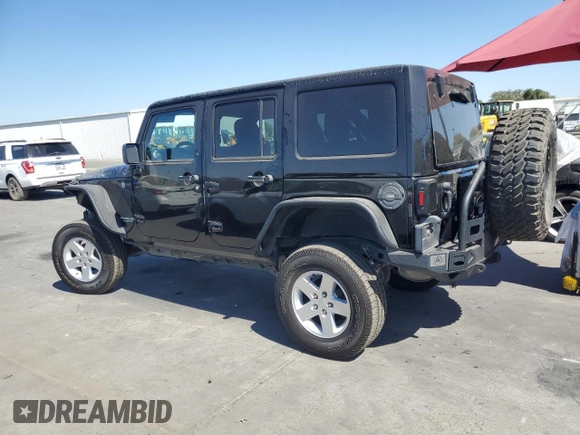 2013 Jeep Wrangler Unlimited Rubicon 10th Anniversary with VIN 1C4HJWFG4DL550832, listed as a Copart auction lot 71633684 with 60,759 mi miles and Salvage title. Bid and sale history available at DreamBid. Image 2.