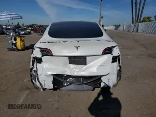 2022 Tesla Model Y Long Range with VIN 7SAYGDEE1NF339663, listed as a Copart auction lot 49771965 with 33,734 mi miles and Salvage Title. Bid and sale history available at carsss.com. Image 6.