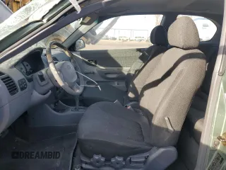 2003 Hyundai Accent GL with VIN KMHCG35CX3U242848, listed as a Copart auction lot 86558394 with 56,248 mi miles and Salvage Title. Bid and sale history available at carsss.com. Image 7.