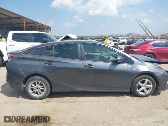 2017 Toyota Prius Two z VIN JTDKARFU3H3030401, wystawiony jako IAAI lot #41882552 z przebiegiem 130 786 mil mil oraz . Historia ofert i sprzedaży dostępna na DreamBid. Obrazek 13.