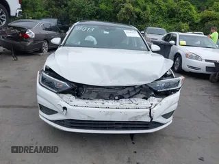 2020 Volkswagen Jetta SEL z VIN 3VWEB7BU4LM008013, wystawiony jako IAAI lot #42182821 z przebiegiem 66 118 mil mil oraz . Historia ofert i sprzedaży dostępna na DreamBid. Obrazek 12.