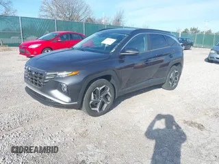 2022 Hyundai Tucson SEL z VIN 5NMJCCAE6NH064395, wystawiony jako IAAI lot #41874438 z przebiegiem 30 798 mil mil oraz . Historia ofert i sprzedaży dostępna na DreamBid. Obrazek 2.