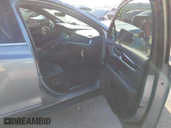 2025 Cadillac XT5 FWD Premium Luxury with VIN 1GYKNCRS7SZ104526, listed as a IAAI auction lot 41468623 with 3,896 mi miles. Bid and sale history available at carsss.com. Image 5.
