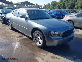 2006 Dodge Charger R/T with VIN 2B3KA53HX6H279600, listed as a IAAI auction lot 40311519 with 273,679 mi miles. Bid and sale history available at carsss.com. Image 1.