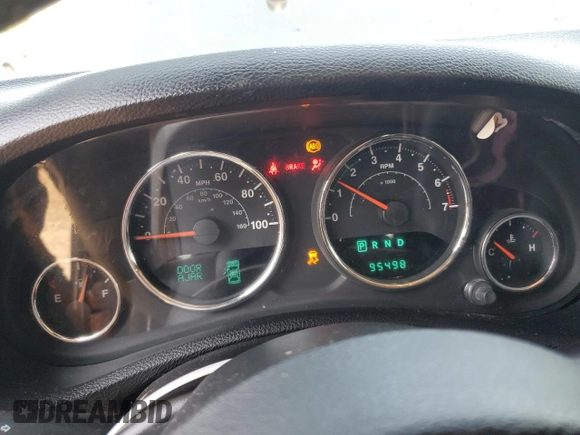 2012 Jeep Wrangler Unlimited Sport with VIN 1C4BJWDG8CL116811, listed as a Copart auction lot 59372085 with 95,498 mi miles and Salvage title. Bid and sale history available at DreamBid. Image 9.