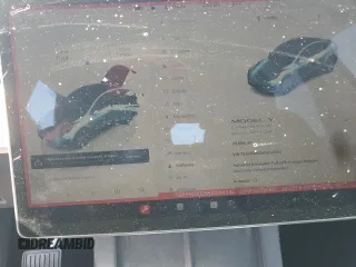2024 Tesla Model Y Long Range z VIN 7SAYGDEE5RA244641, wystawiony jako Copart lot #51864845 z przebiegiem 23 096 mil mil oraz Szkoda całkowita • Salvage title. Historia ofert i sprzedaży dostępna na DreamBid. Obrazek 9.