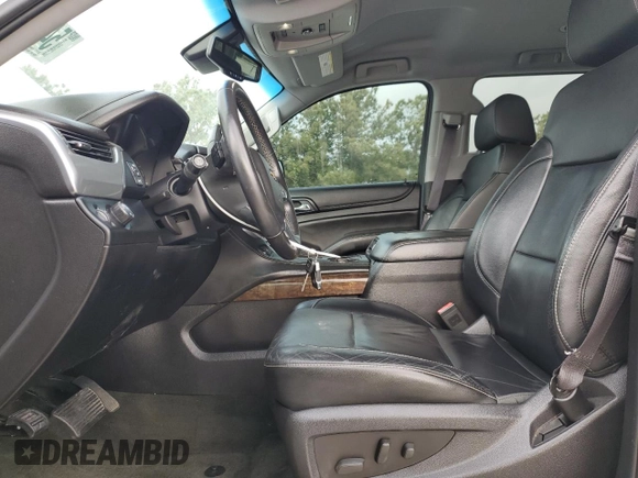 2015 Chevrolet Tahoe LT with VIN 1GNSCBKC9FR220574, listed as a Copart auction lot 54788555 with 244,491 mi miles and Salvage title. Bid and sale history available at DreamBid. Image 7.