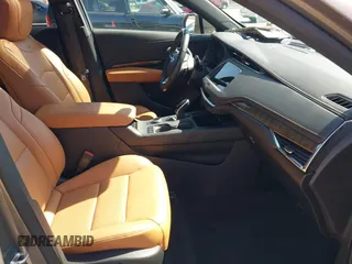 2020 Cadillac XT4 FWD Sport with VIN 1GYFZER4XLF032646, listed as a IAAI auction lot 42078928 with 11,987 mi miles and . Bid and sale history available at DreamBid. Image 5.