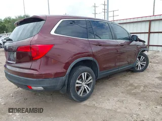2018 Honda Pilot EX-L with VIN 5FNYF5H59JB030003, listed as a IAAI auction lot 42358798 with Not provided miles and . Bid and sale history available at DreamBid. Image 4.