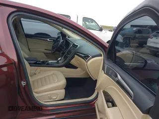 2015 Ford Fusion SE Hybrid with VIN 3FA6P0LU8FR172313, listed as a IAAI auction lot 41556556 with 152,567 mi miles. Bid and sale history available at carsss.com. Image 5.