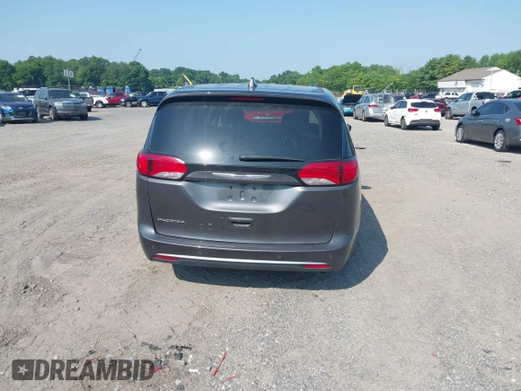 2020 Chrysler Pacifica Touring with VIN 2C4RC1FG6LR120775, listed as a IAAI auction lot 42562876 with 119,853 mi miles and . Bid and sale history available at DreamBid. Image 15.