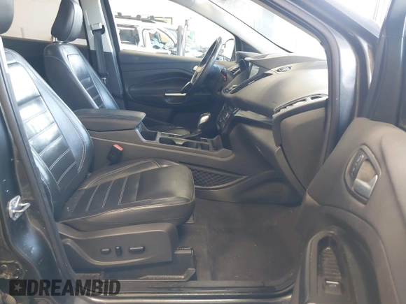 2019 Ford Escape Titanium with VIN 1FMCU9J97KUC55772, listed as a IAAI auction lot 42514001 with 77,737 mi miles and . Bid and sale history available at DreamBid. Image 5.