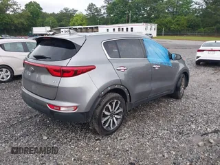 2018 Kia Sportage EX with VIN KNDPN3AC0J7310720, listed as a IAAI auction lot 42400165 with 118,929 mi miles and . Bid and sale history available at DreamBid. Image 4.
