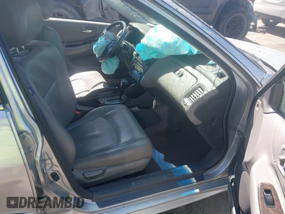 2002 Honda Accord EX z VIN JHMCG56612C026303, wystawiony jako IAAI lot #41992812 z przebiegiem 153 021 mil mil oraz . Historia ofert i sprzedaży dostępna na DreamBid. Obrazek 5.