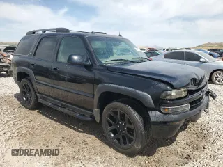 2005 Chevrolet Tahoe LT with VIN 1GNEK13T35R257272, listed as a Copart auction lot 61173025 with 145,933 mi miles and Salvage title. Bid and sale history available at DreamBid. Image 4.