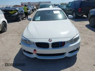 2015 BMW 4 Series 428i z VIN WBA3V7C52FP771779, wystawiony jako IAAI lot #41953647 z przebiegiem 66 003 mil mil oraz . Historia ofert i sprzedaży dostępna na DreamBid. Obrazek 12.