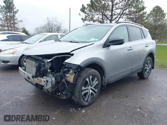 2018 Toyota RAV4 LE with VIN 2T3BFREVXJW717079, listed as a IAAI auction lot 42001580 with 96,044 mi miles. Bid and sale history available at carsss.com. Image 17.