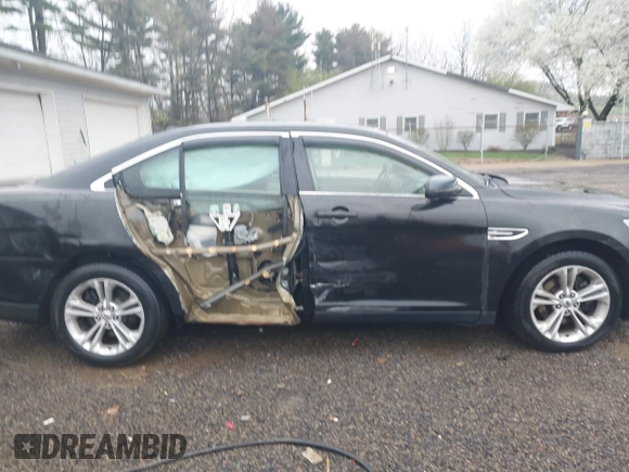 2013 Ford Taurus SEL with VIN 1FAHP2E83DG107913, listed as a IAAI auction lot 42007575 with 147,240 mi miles. Bid and sale history available at carsss.com. Image 14.