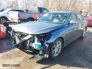 2014 Hyundai Genesis 3.8L with VIN KMHGC4DD2EU265539, listed as a IAAI auction lot 41634825 with 61,619 mi miles. Bid and sale history available at carsss.com. Image 2.