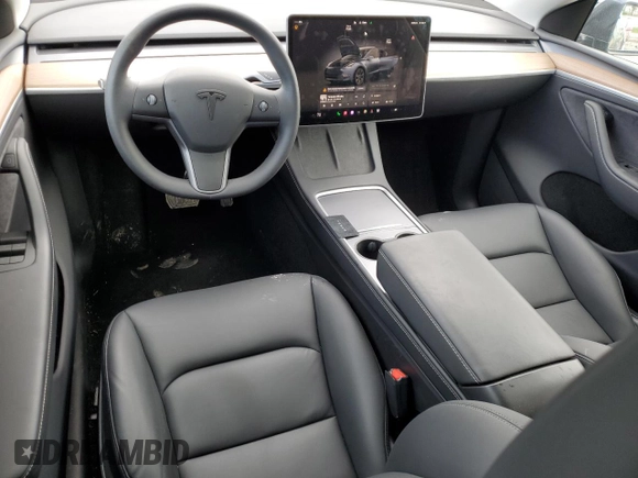 2024 Tesla Model Y with VIN 7SAYGDED1RA321691, listed as a Copart auction lot 52153945 with 7,544 mi miles and Salvage Title. Bid and sale history available at DreamBid. Image 8.