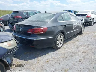 2015 Volkswagen CC R-Line with VIN WVWBP7AN9FE823240, listed as a IAAI auction lot 41697065 with Not Provided miles and . Bid and sale history available at DreamBid. Image 4.