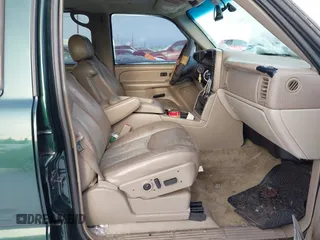 2003 Chevrolet Suburban LT z VIN 3GNFK16Z63G166885, wystawiony jako IAAI lot #41150771 z przebiegiem 290 630 mil mil oraz . Historia ofert i sprzedaży dostępna na DreamBid. Obrazek 5.