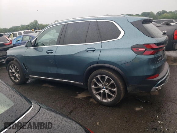 2024 BMW X5 xDrive40i with VIN 5UX23EU02R9T63818, listed as a Copart auction lot 60195525 with 26,773 mi miles and Salvage title. Bid and sale history available at DreamBid. Image 2.