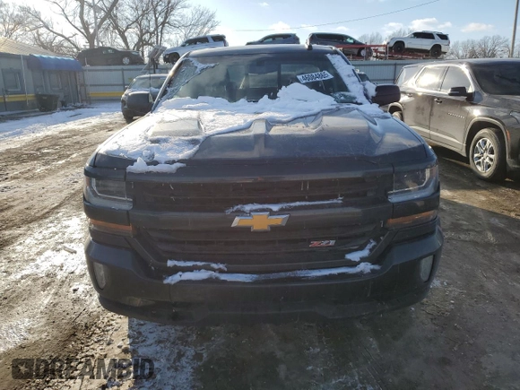2017 Chevrolet Silverado 1500 LT with VIN 1GCVKREC8HZ223773, listed as a Copart auction lot 46084865 with 135,279 mi miles and Salvage Title. Bid and sale history available at DreamBid. Image 5.