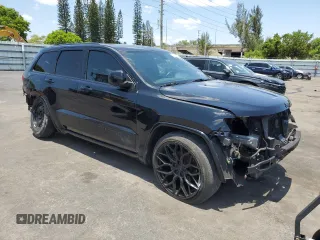 2017 Jeep Grand Cherokee Altitude with VIN 1C4RJEAG3HC952451, listed as a Copart auction lot 55658735 with 92,286 mi miles and Salvage title. Bid and sale history available at DreamBid. Image 4.
