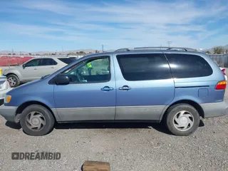 2000 Toyota Sienna LE with VIN 4T3ZF13C3YU220127, listed as a IAAI auction lot 41885903 with 168,765 mi miles. Bid and sale history available at carsss.com. Image 14.