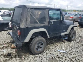 1999 Jeep Wrangler SE z VIN 1J4FY29P0XP479580, wystawiony jako Copart lot #63075455 z przebiegiem 160 986 mil mil oraz Szkoda całkowita • Salvage title. Historia ofert i sprzedaży dostępna na DreamBid. Obrazek 3.