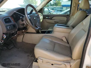 2009 Chevrolet Suburban LT w/2LT with VIN 1GNFC26J89R301726, listed as a Copart auction lot 73559004 with 188,380 mi miles and Salvage Title. Bid and sale history available at carsss.com. Image 7.