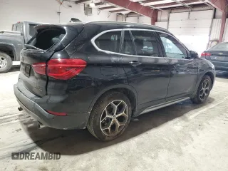 2018 BMW X1 xDrive28i with VIN WBXHT3C37J5L30341, listed as a Copart auction lot 42691505 with 84,523 mi miles and Salvage Title. Bid and sale history available at carsss.com. Image 3.