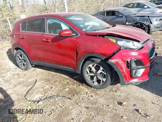 2021 Kia Sportage LX with VIN KNDPM3AC7M7938121, listed as a IAAI auction lot 40975546 with 65,319 mi miles. Bid and sale history available at carsss.com. Image 1.