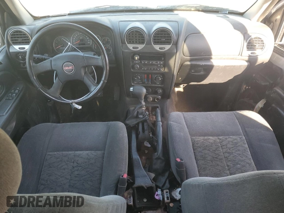 2005 GMC Envoy SLT with VIN 1GKDS13SX52322725, listed as a Copart auction lot 82032674 with 249,288 mi miles and Salvage Title. Bid and sale history available at carsss.com. Image 8.