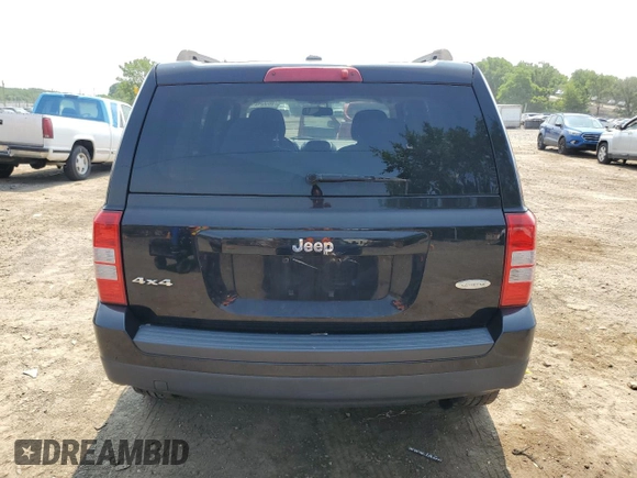 2014 Jeep Patriot Latitude with VIN 1C4NJRFB3ED761587, listed as a Copart auction lot 60554245 with 138,763 mi miles and Salvage title. Bid and sale history available at DreamBid. Image 6.