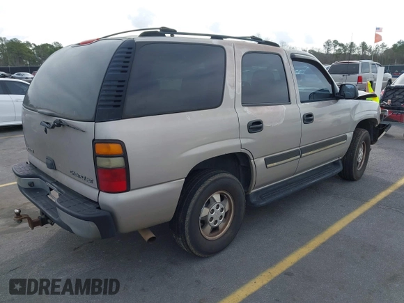 2004 Chevrolet Tahoe LT z VIN 1GNEC13Z34J258811, wystawiony jako IAAI lot #41710156 z przebiegiem 322 462 mil mil oraz . Historia ofert i sprzedaży dostępna na DreamBid. Obrazek 4.