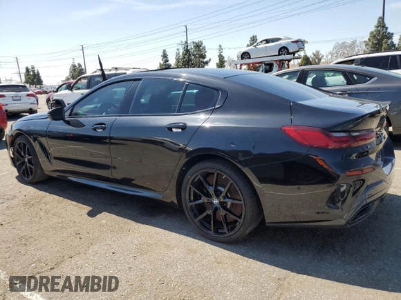 2022 BMW 8 Series M850i with VIN WBAGV8C02NCK08667, listed as a Copart auction lot 50335155 with 22,737 mi miles and Salvage title. Bid and sale history available at DreamBid. Image 2.