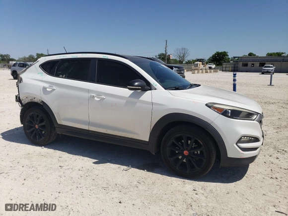 2017 Hyundai Tucson Value with VIN KM8J33A21HU549347, listed as a Copart auction lot 52620985 with 101,043 mi miles and Salvage Title. Bid and sale history available at carsss.com. Image 4.